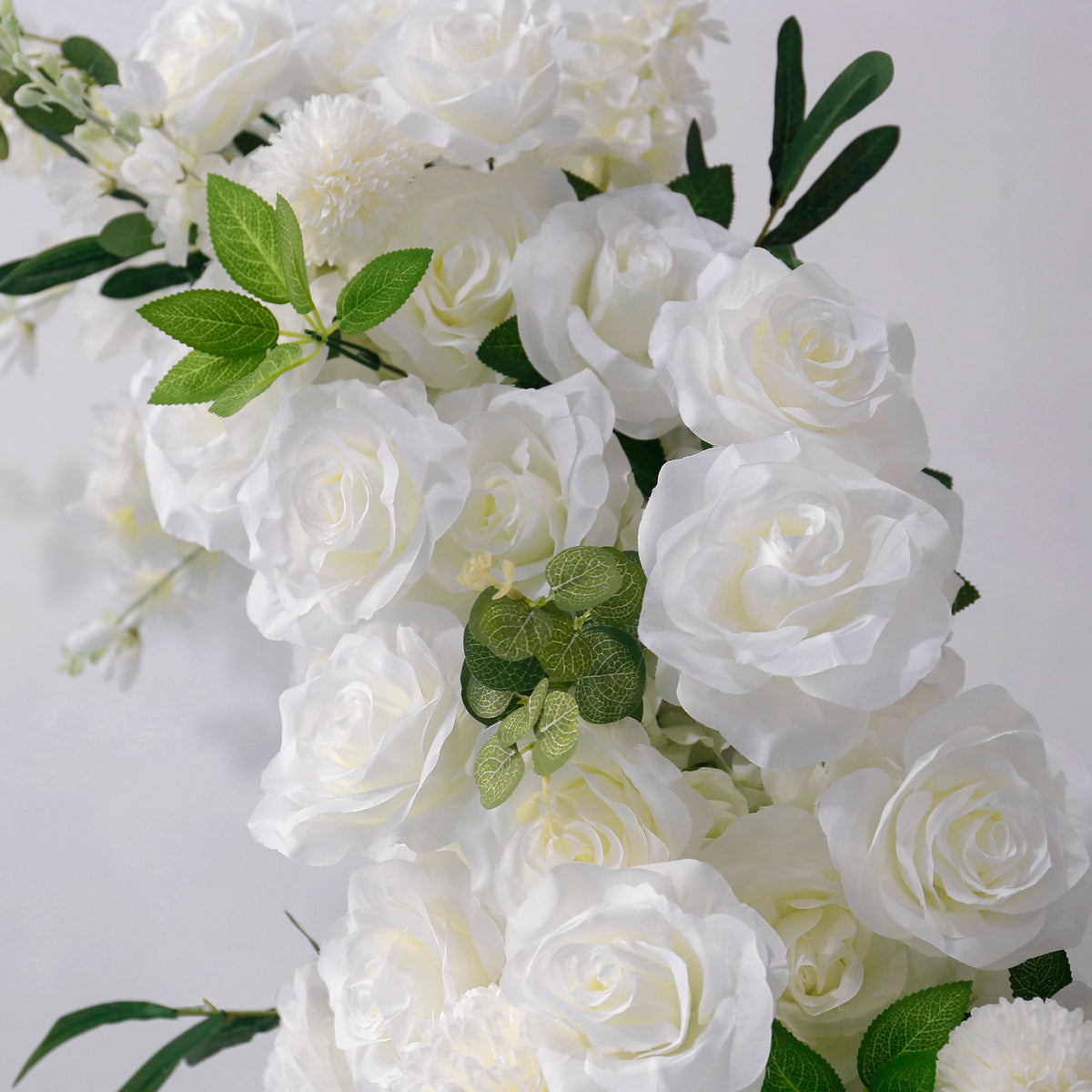 white-rose-flower-arrangement-decoration-horn-arch-wedding-stage-background