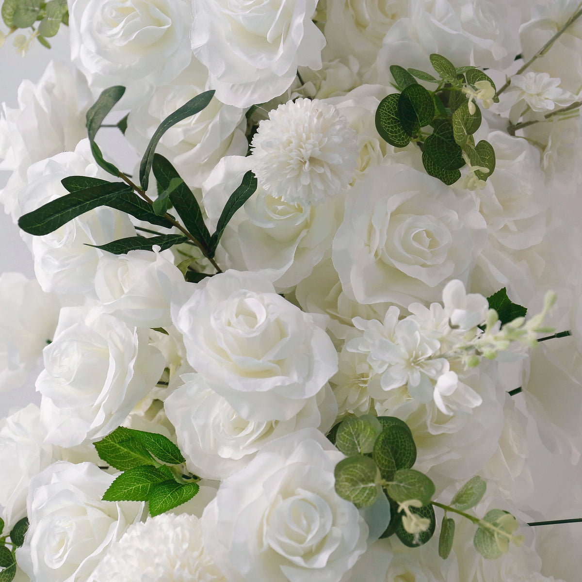 white-rose-flower-arrangement-decoration-horn-arch-wedding-stage-background