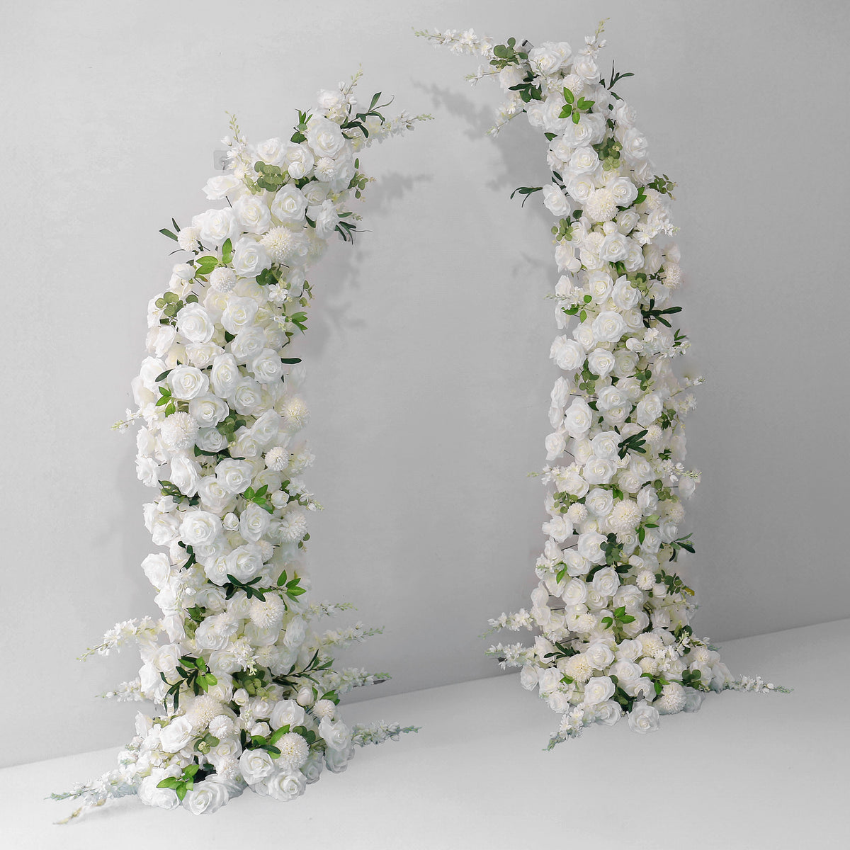 white-rose-flower-arrangement-decoration-horn-arch-wedding-stage-background