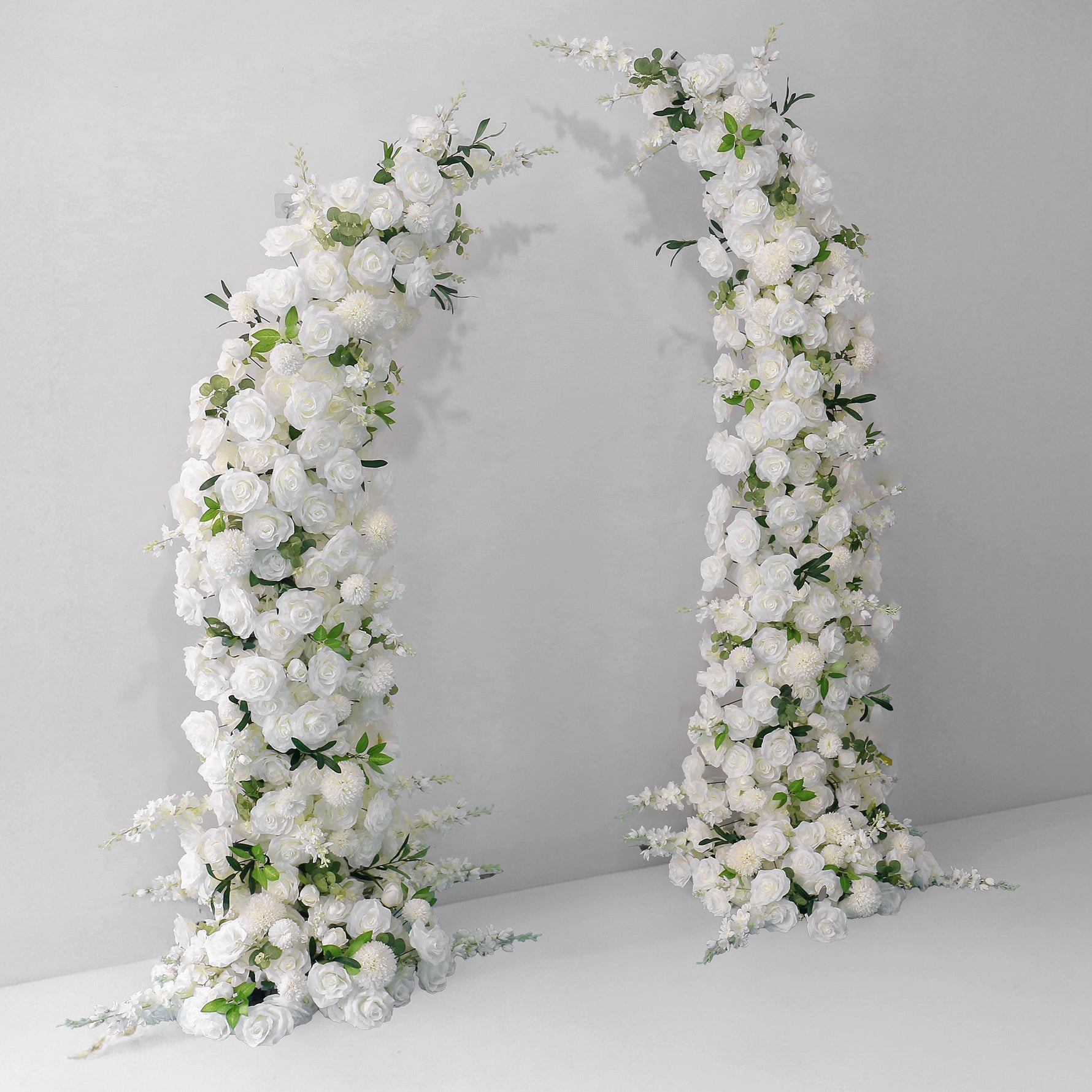 white-rose-flower-arrangement-decoration-horn-arch-wedding-stage-background